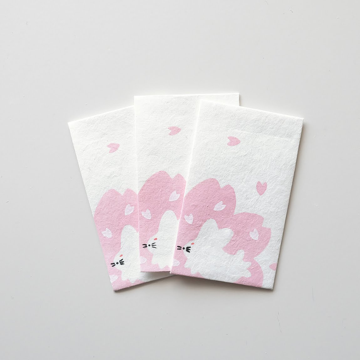 【新登場！伝統技法、型染めで一色ずつ職人が手摺りで製作しました！】手摺り型染めぽち袋 桜に兎