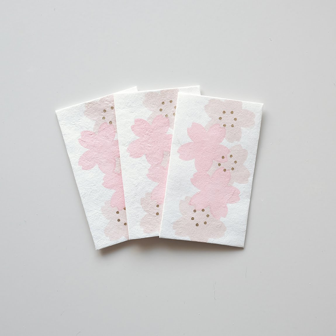 【新登場！伝統技法、型染めで一色ずつ職人が手摺りで製作しました！】手摺り型染めぽち袋 SAKURA